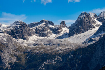 Snow covered peaks and summits of the Mountains in the Dolomites after the first snow of the year - Host of the 2026 winter Olympic Games