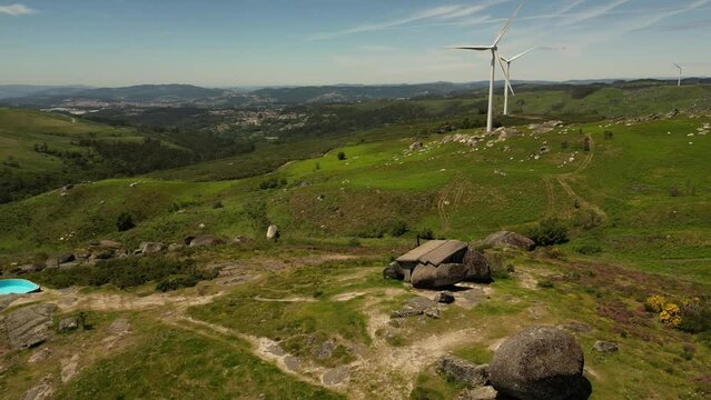 Lisbon, Portugal. People visit the stone house on the hill in Papi, near Guimar&atilde;es, Portugal