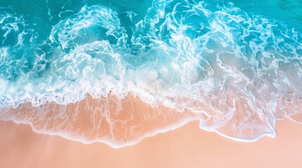 Sandy beach and soft blue ocean wave top view. Summer background