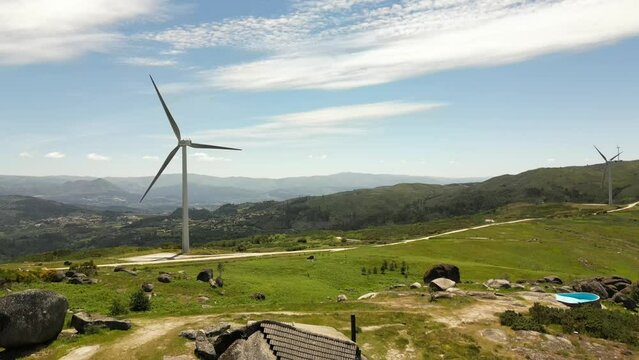 Aerial video above Casa do Penedo Boulder House in Fafe, Portugal