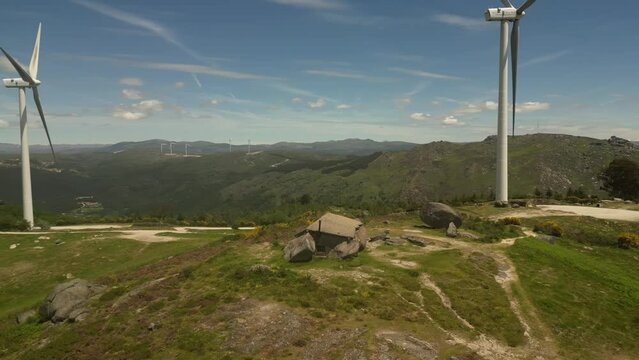 Aerial video above Casa do Penedo Boulder House in Fafe, Portugal