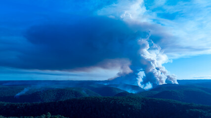 Drone aerial photograph of controlled bush fire hazard reduction burning by the Rural Fire Service in the Blue Mountains in NSW, Australia.
