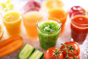 Glasses with fresh organic vegetable and fruit juices
