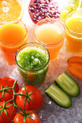 Glasses with fresh organic vegetable and fruit juices