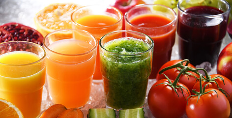 Glasses with fresh organic vegetable and fruit juices