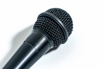 A microphone with a black cord and a black head