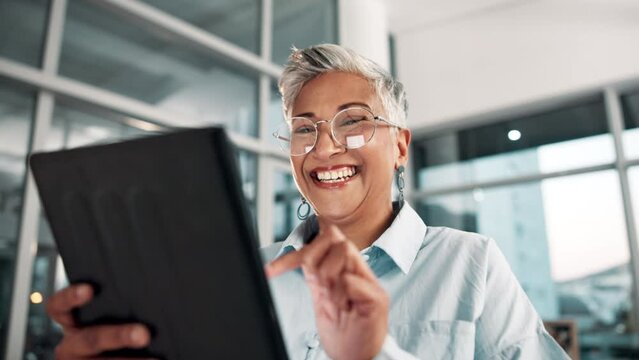 Office, internet and mature woman with tablet for online, research and digital finance review. Financial advisor, laughing and happy with technology for investment, budget feedback and good report