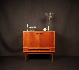 vintage furniture and accessories on a dark background