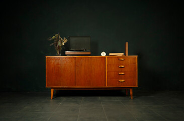 vintage furniture and accessories on a dark background