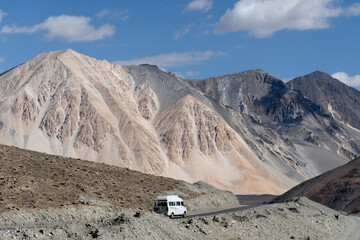 Car driving through the mountains in Ladakh, India