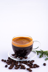 Coffee break. Coffee cup and coffee beans on the white background.