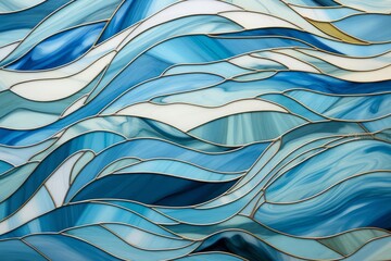 A highresolution image of an abstract stained glass artwork, depicting waves in a palette of blues, grays, and tans, captured to emphasize the detailed design and the vibrant, fluid movement
