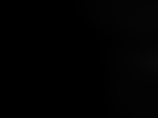 A black background with a white background,abstract black background with some smooth lines.black background vector illustration texture and dark gray charcoal paint, dark and gray abstract wallpaper.