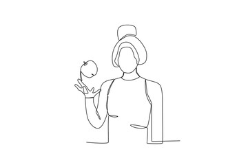 Single continuous line drawing of a Woman throwing apples, world vegetarian day concept. One line draw design vector illustration