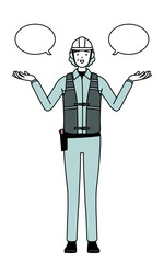 Senior female engineer in helmet and work wear with wipeout and comparison.