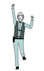 Senior female engineer in helmet and work wear smiling and jumping.