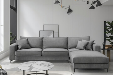 Simple gray sectional sofa in a minimalist space with marble accents.