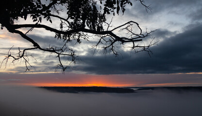 Fototapeta premium Overviewing the Kabanga area in the north-west of Tanzania bordering Burundi on an early misty morning creating a beautiful and peaceful atmosphere.