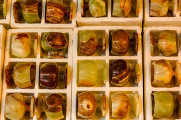 Onyx tableware for sale at the shop in Turkey. Crockery made of natural stone