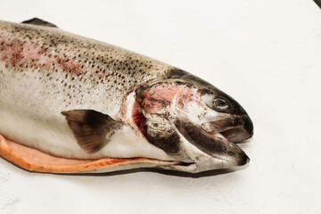 Fish red river trout, cleaning the scales, home cooking