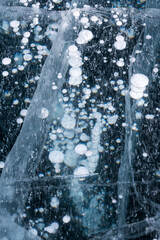 Gas methane bubbles frozen in blue ice of lake Baikal
