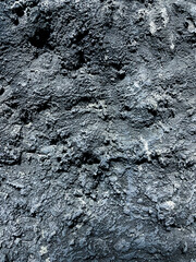 close up view old grunge wall with rough stone texture background