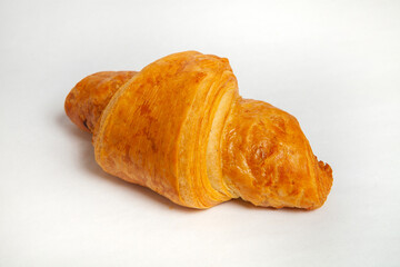 Fresh croissants isolated on white background.