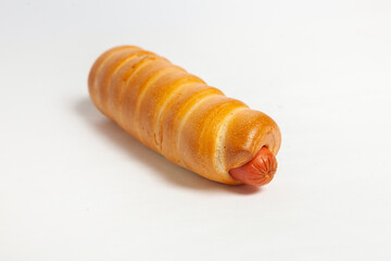 Sausage in the dough isolated on a white background.