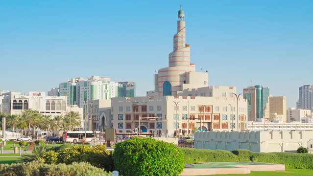 Doha, Qatar- Jan 14 2024, 4k, Panoramic view of the Sheikh bin Zaid Qatar islamic cultural center, Fanar, in the foreground a square in palm trees and shrubs, at daytime, Doha, Qatar 