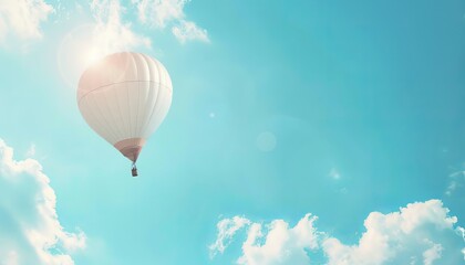 Obraz premium Floating Serenity: Hot Air Balloon Gracefully Drifting Through the Blue Sky. Customize with Your Mes