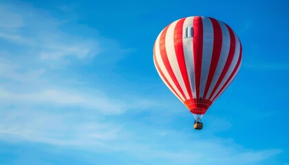 Obraz premium Cruising the Skies: Stunning Red and White Hot Air Balloon Soaring over Budapest, Hungary on a Clear