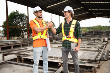 Portrait happy caucasian engineer man working and hand shake with Hispanic Latin engineer man at...