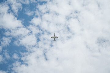flying object airplane helicopter flying in the blue sky at high speed, clear sky background