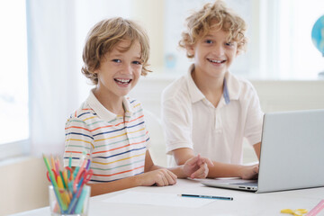 Child in school. Student in class. Boy at homework