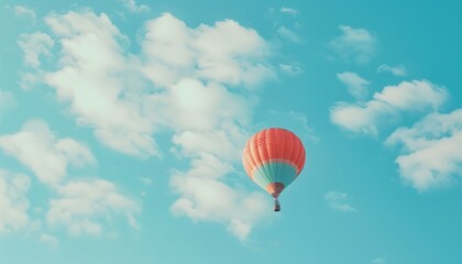 Fototapeta premium Up, Up and Away: Vibrant Hot Air Balloon Soaring through a Blue Cloudy Sky with Ample Copy Space