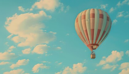 Naklejka premium Spectacular Colorful Hot Air Balloon Soaring through the Blue Sky