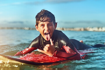 Portrait, boy or excited surfer at sea for fitness training, workout or sports exercise in water....