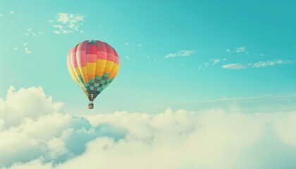 Fototapeta premium Scenic Flight: Tourists Soar in Multicolored Hot Air Balloon Against Blue Sky and White Clouds