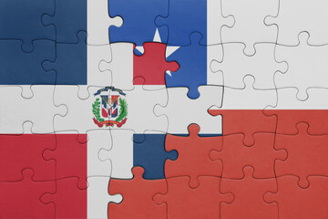 puzzle with the colourful national flag of chile and flag of dominican republic .