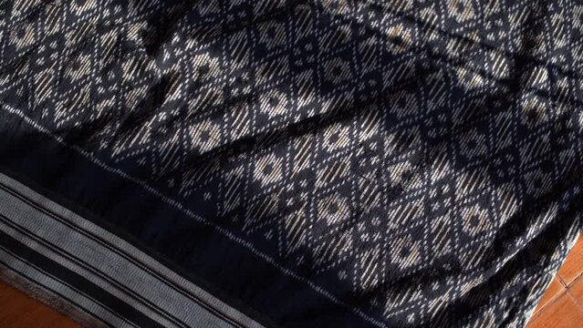 The culture and traditions of the Phu Thai ethnic group are reflected in their traditional clothing, which features unique decorations and creative textile patterns specific to their tribe. 