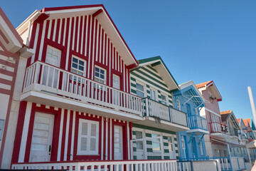 Facades of colorful fisheman houses in Costa Nova, Aveiro, Portugal