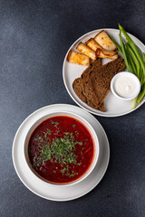 Ukrainian dish.  Borscht with meat and sour cream.