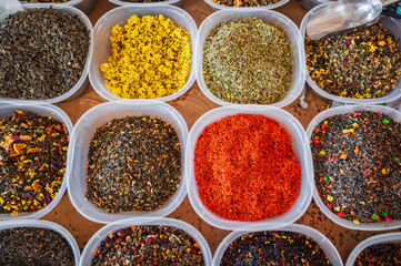 assortment of various oriental herbal and floral teas on the counter at Turkish spice market. View top