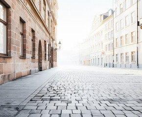 Empty street with modern architecture and natural sun lighting. Urban scenes.