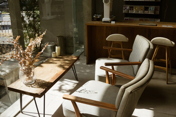 Tables and chairs arranged in a cozy coffee shop setting