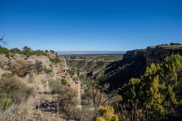 Fototapeta premium Majestic Canyon Landscape with Clear Blue Sky for Text Overlay