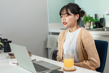 Happy young Asian Woman Successful working with laptop checking happy congrats get good news Young...