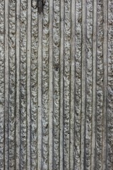 a linear pattern on a stone wall