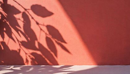 light background of shadows from plant leaves on a delicate light red wall, minimalistic background for the presentation of your products, stock wallpaper image template