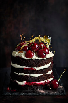 Black Forest Gateaux cake with cherries and spun sugar